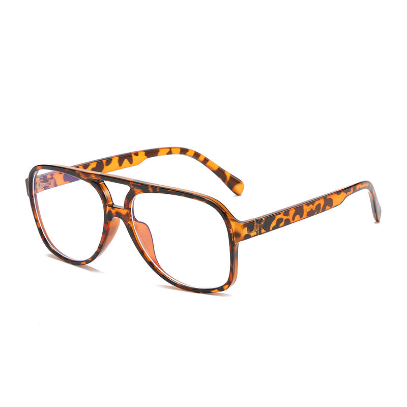 Tortoiseshell eyeglasses on a white background