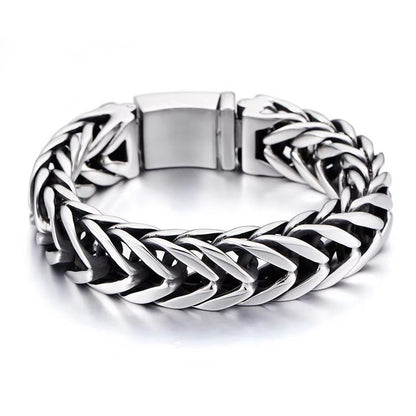 Silver braided bracelet on a white background