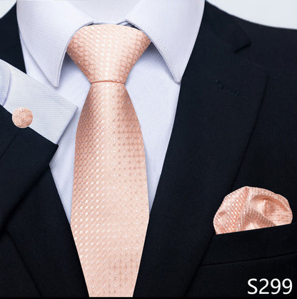 Rose gold tie and pocket square set with black suit and white shirt