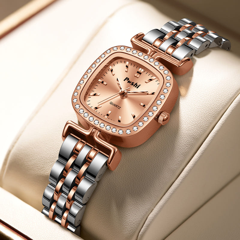 Women’s two-tone watch with diamond-encrusted bezel, rose-gold dial, and metal link bracelet