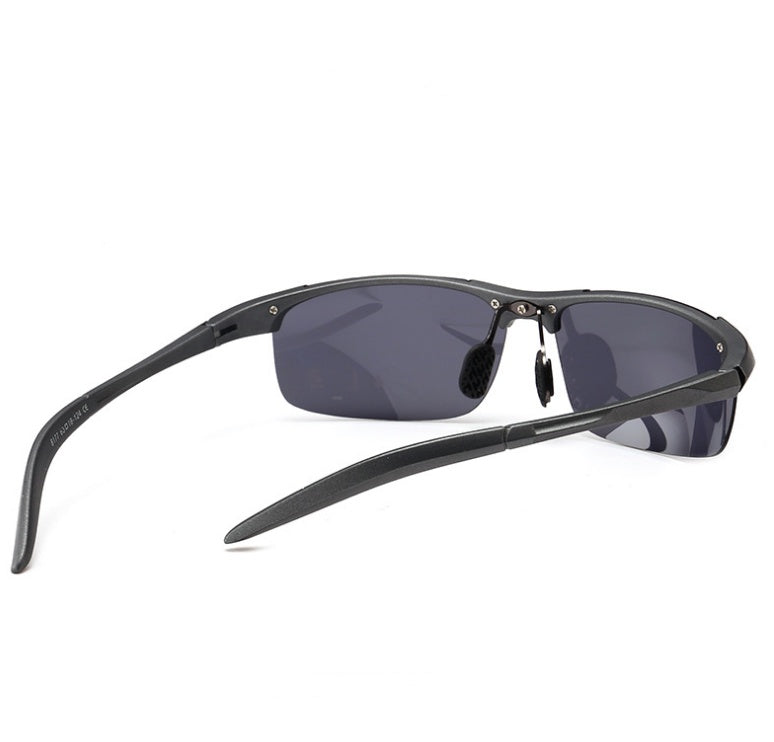 Black sunglasses with dark lenses on a white background