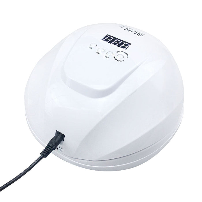 White nail dryer with digital display on a white background