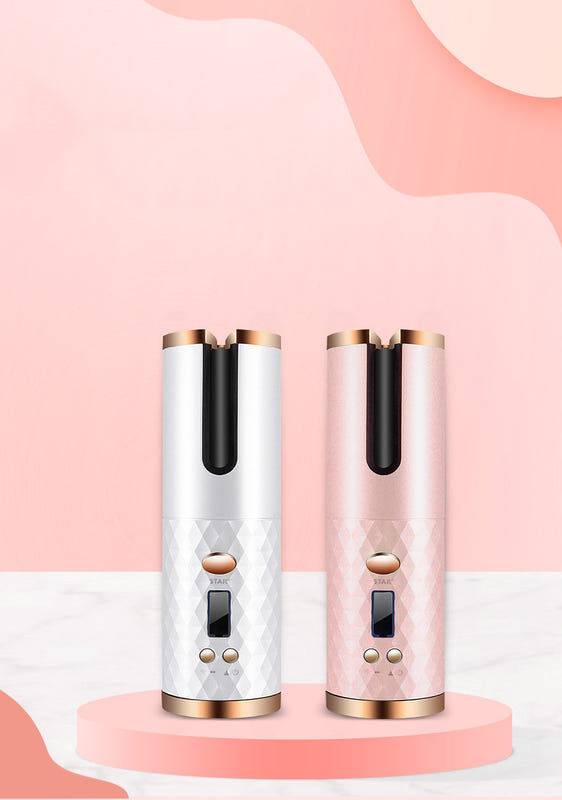 White and black automatic hair curler with gold accents and dual-tone barrel