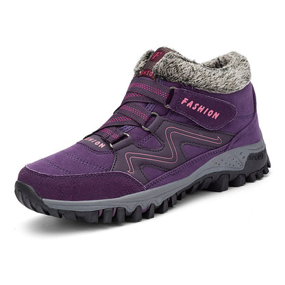 Mid-cut casual sports shoes with thick sole, purple upper with gray outsole and fuzzy cuff.