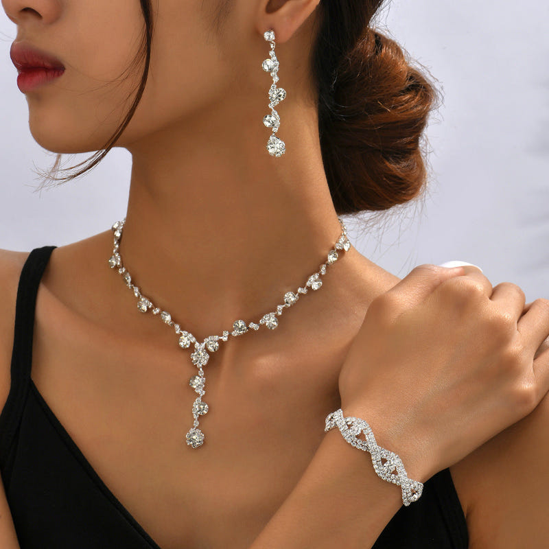 Silver-tone crystal necklace, drop earrings, and tennis bracelet jewelry set