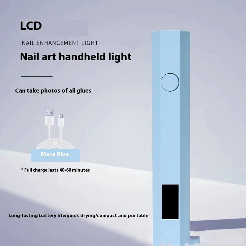 Nail art handheld light with charging cable on a gray background
