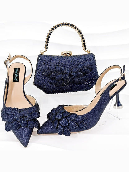 Dark blue rhinestone heeled shoes with matching beaded handbag and flower appliques