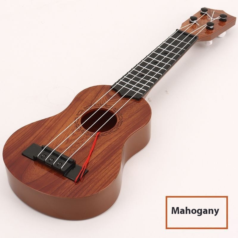 Wooden ukulele with 'Mahogany' label on a white background