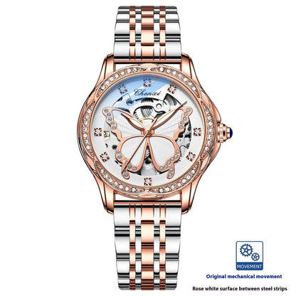 Luxury watch with rose gold and silver band on white background