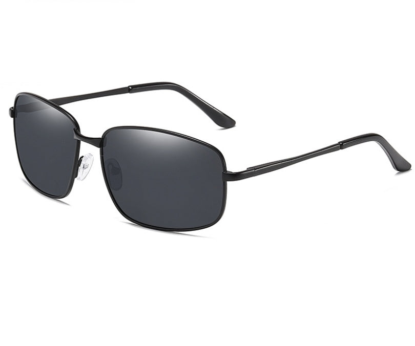 Black sunglasses with dark lenses on a white background