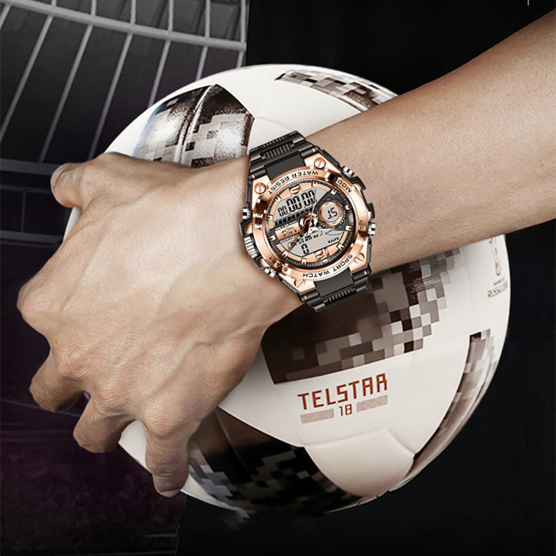 Hand wearing a rose gold watch on a soccer ball with 'Telstar' branding