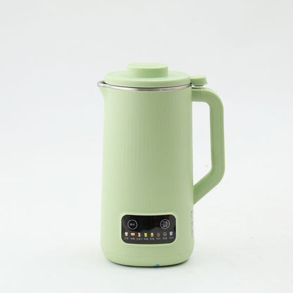 Green electric soy milk maker with lid, handle, and front control panel