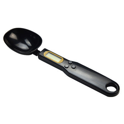 Digital measuring spoon on a white background