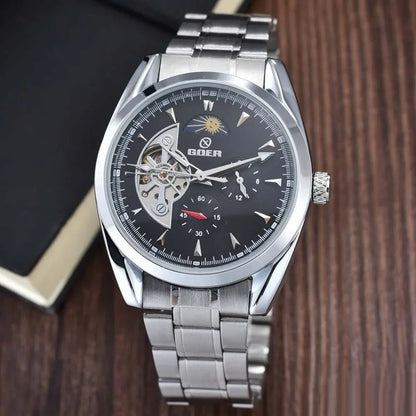 Men's mechanical hollow-dial watch, black face, skeleton hands, steel bracelet