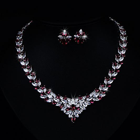 Jewelry set with necklace and earrings on a black background