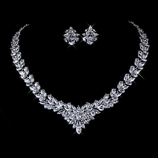 Jewelry set with necklace and earrings on a black background