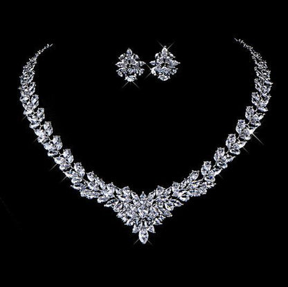 Jewelry set with necklace and earrings on a black background