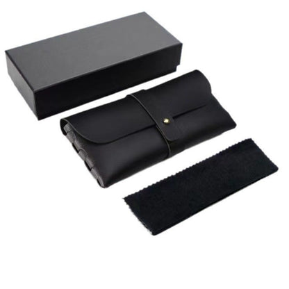 Black leather travel set with a wallet, headband, and box on a white background