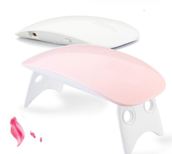 White and pink Nail Drayer on a white background