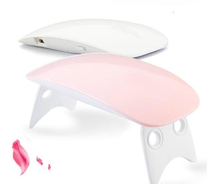 White and pink Nail Drayer on a white background