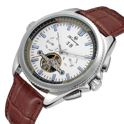 Watch with brown leather strap and white face displaying brand name