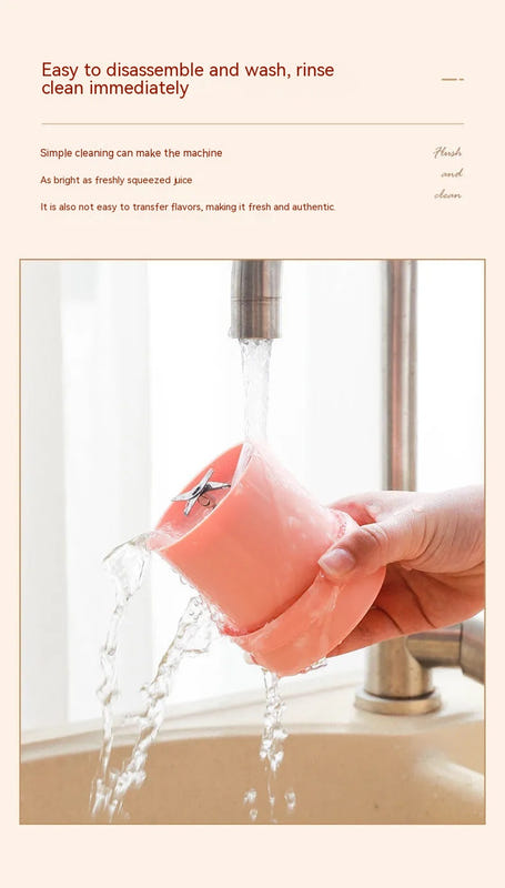 Pink mini juicer cup under running water while being rinsed