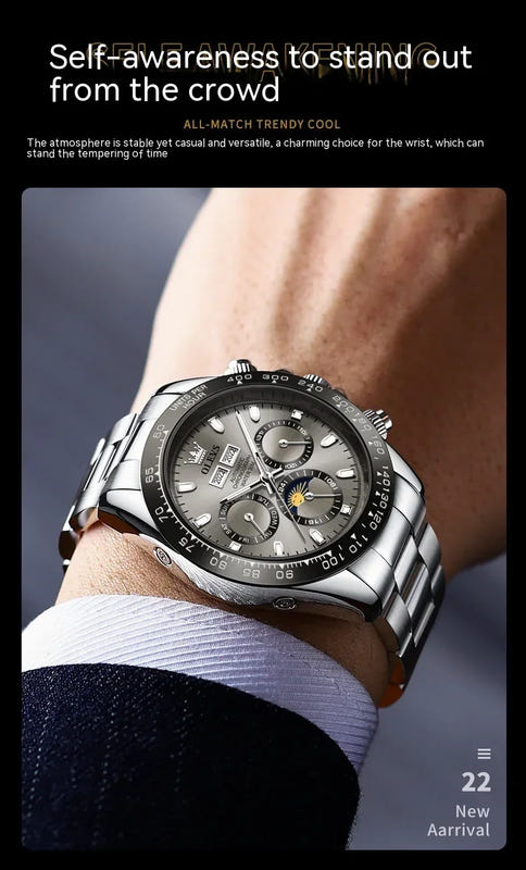 Stainless steel mechanical wristwatch on wrist, gray dial with subdials and bezel