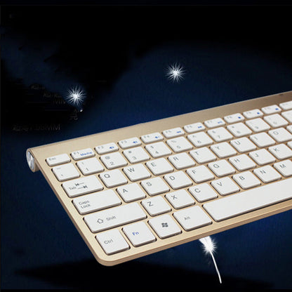 Gold portable mini wireless keyboard with visible key labels