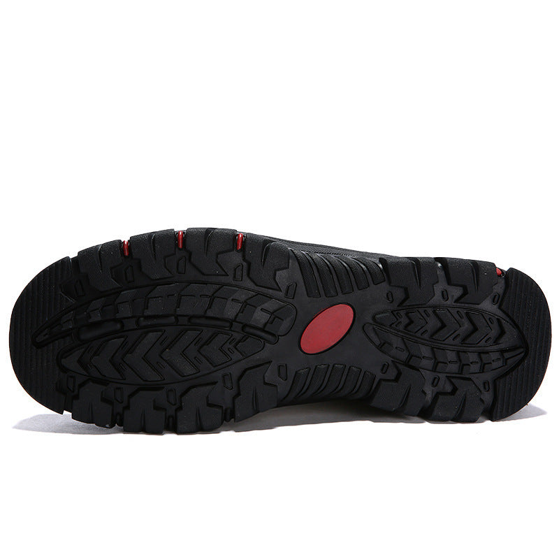 Black shoe sole with red accent on a white background