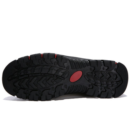 Black shoe sole with red accent on a white background