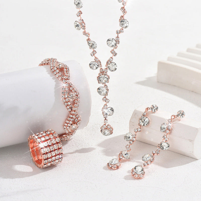 Rose gold crystal necklace and bracelet set with matching drop earrings