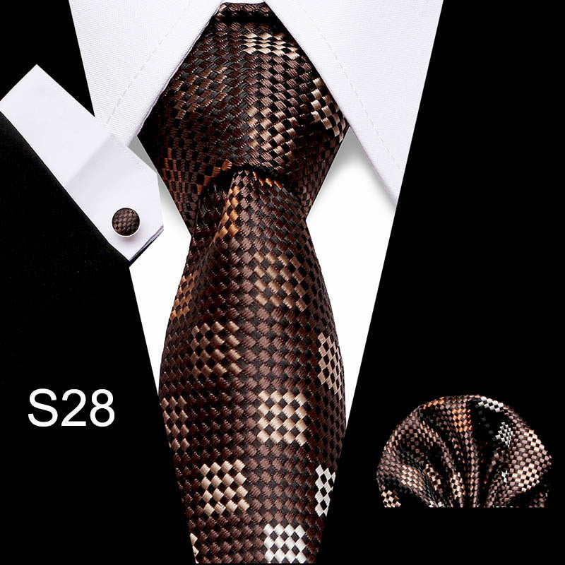 Patterned tie and pocket square set on a black and white background with 'S28' displayed.