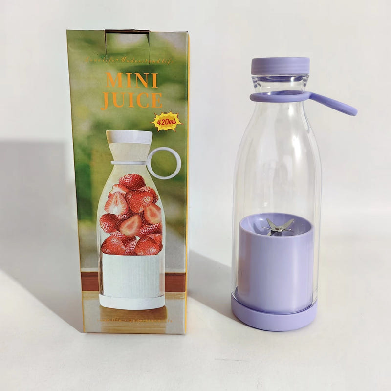 Mini juice blender bottle with purple lid, side handle, and clear cup with blades