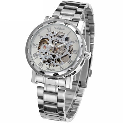 Silver wristwatch with transparent face on a white background