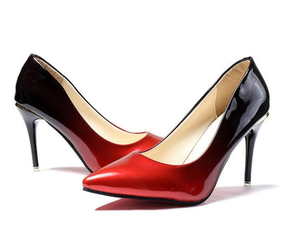 Black and red high-heeled shoes on a white background
