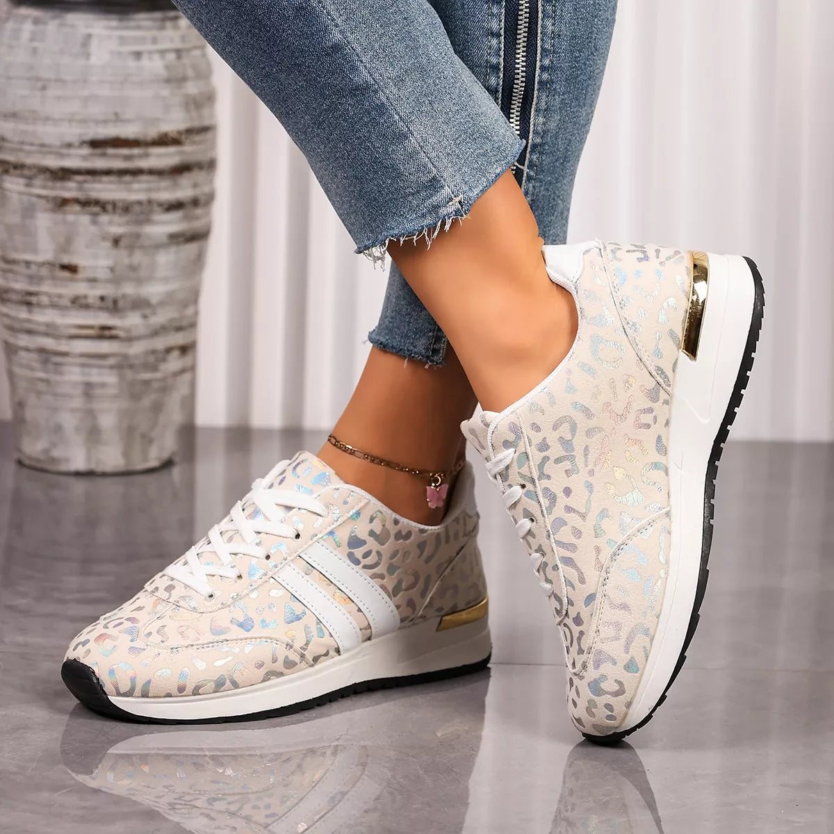 Leopard print lace-up sneakers in white with white laces and textured black outsole