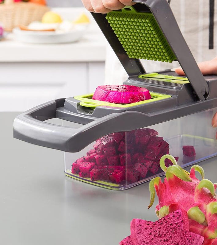 7-in-1 vegetable cutter slicing pink beet into clear container with green grid