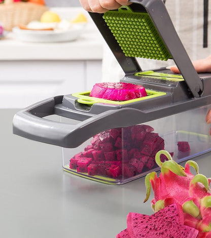 7-in-1 vegetable cutter slicing pink beet into clear container with green grid