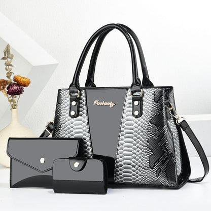 Gray-and-black shoulder tote bag set with scalloped texture, front pocket, and wallet