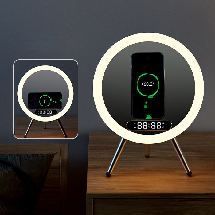 Round LED lamp with smartphone holder on a wooden surface