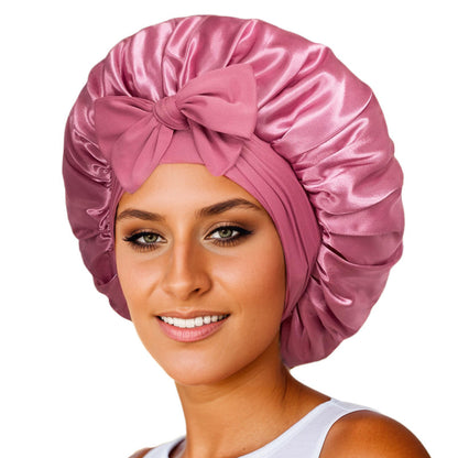 Satin ribbon round cap in pink satin, ruched bonnet with bow on top