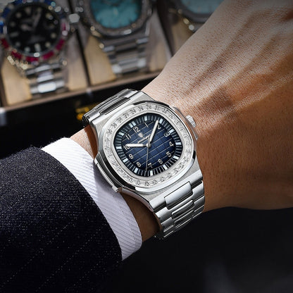 Quartz dress watch with silver metal bracelet and dark blue dial on a wrist
