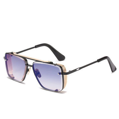 Sunglasses with black frame and blue gradient lenses on a white background