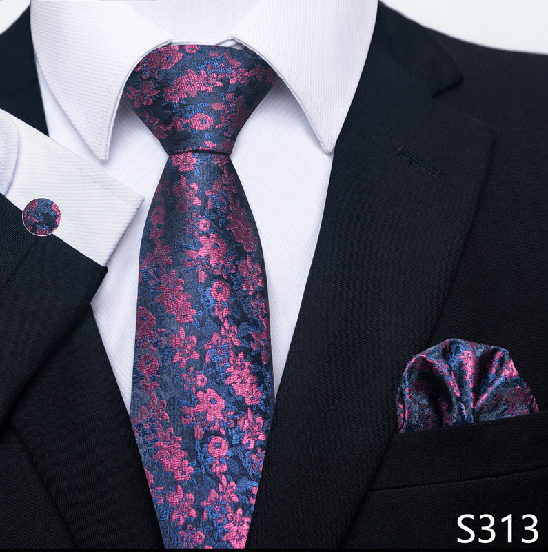 Floral tie and pocket square set with a black suit and white shirt