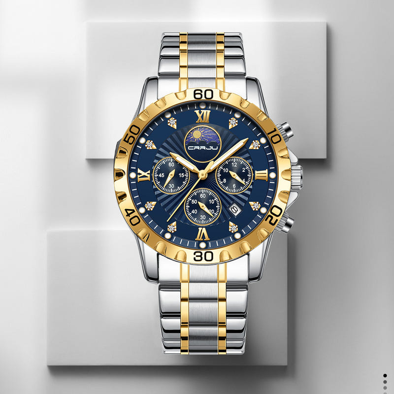 Two-tone quartz business watch with blue dial and gold calendar window; metal bracelet