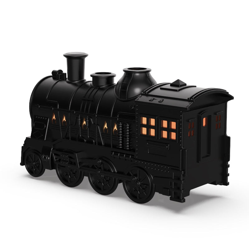 Black toy train engine on a white background