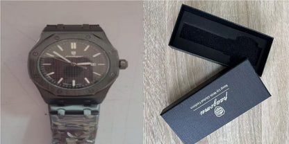 Black quartz wristwatch with dark dial and metal link bracelet, round octagonal bezel.