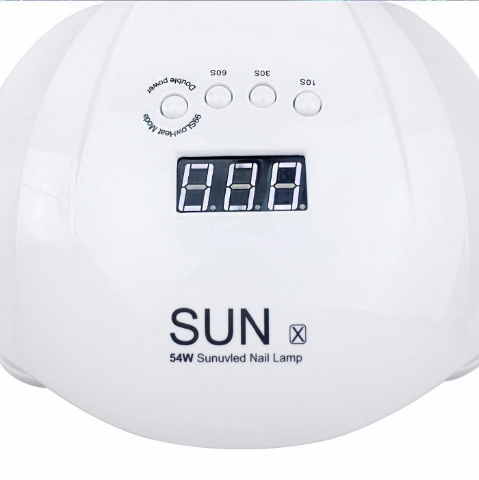 White sunlamp with digital display and control buttons on a white background