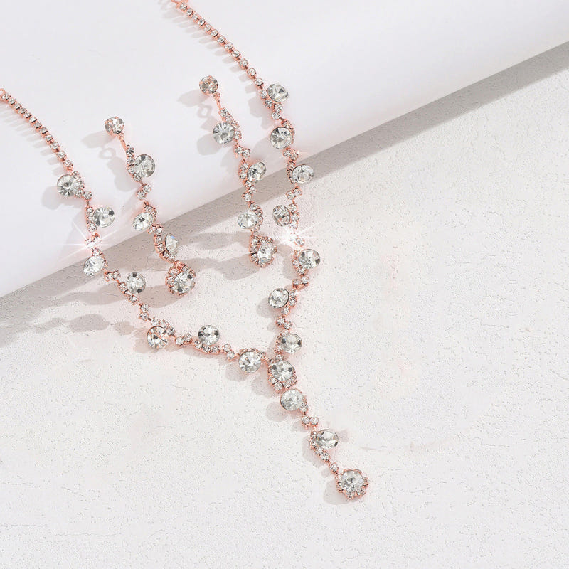 Rose-gold crystal necklace with matching earrings and bracelet