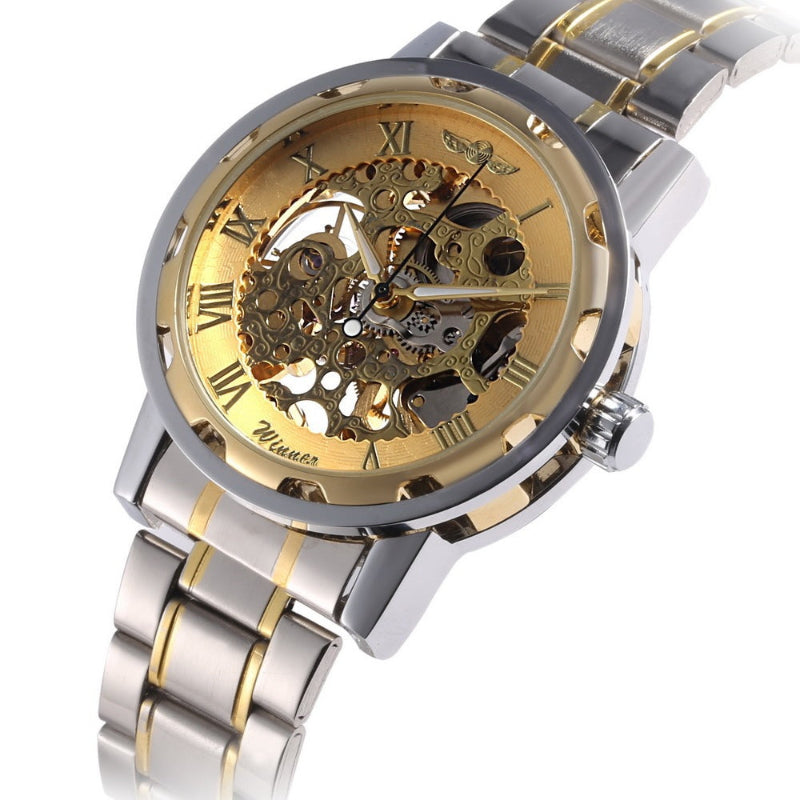 Silver and gold watch with visible brand name on a white background